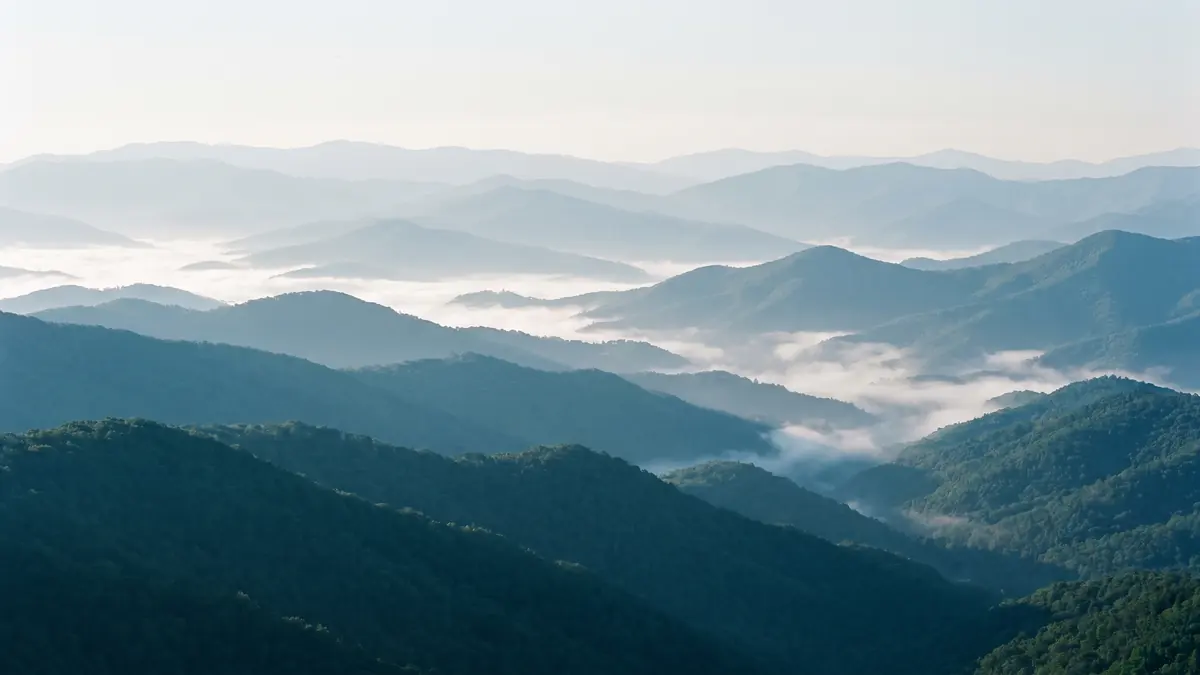 Layered ridgelines of the Blue Ridge Mountains in North Carolina at dawn